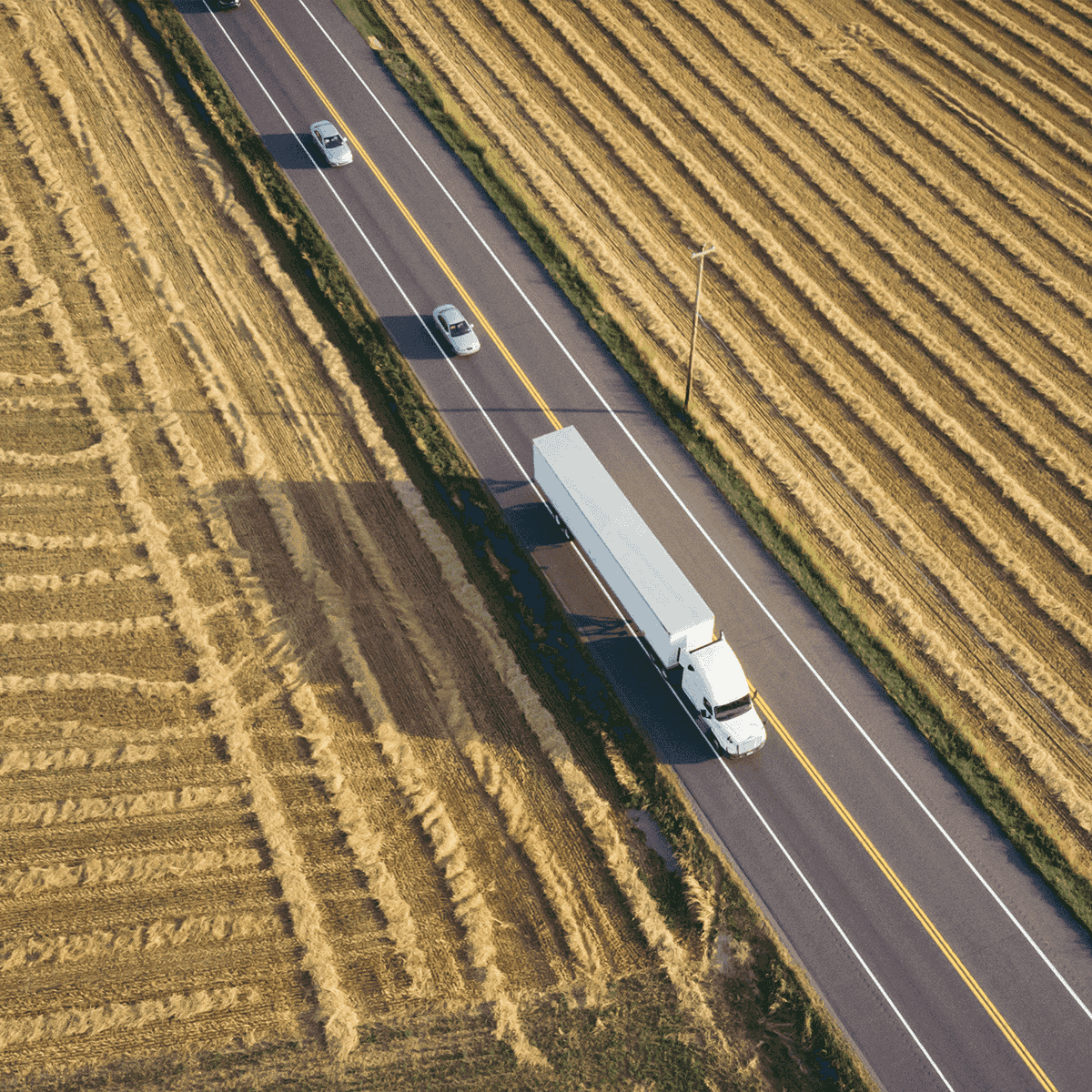 Truck on farmland highway